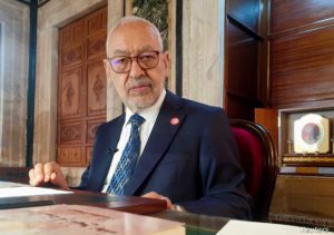 FILE PHOTO: Parliament Speaker Rached Ghannouchi poses during an interview with Reuters in his office, in Tunis
