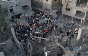 A view shows the site of Israeli strikes on houses in the central Gaza Strip