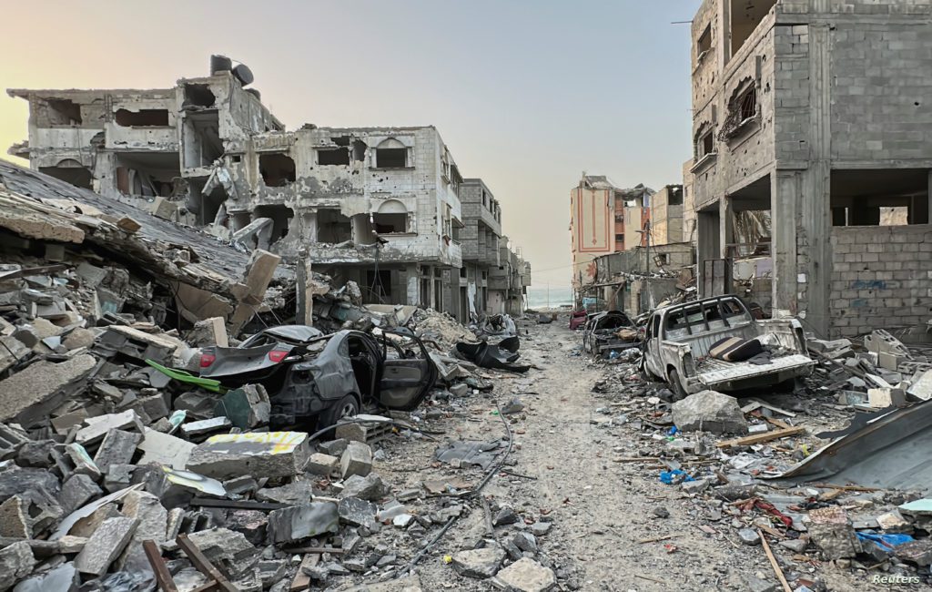 Houses destroyed in Israeli strikes during the conflict lie in ruin, in Beach refugee camp, in Gaza City