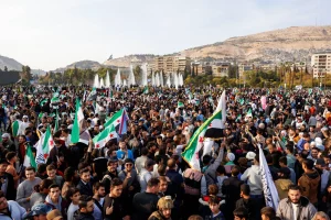 مظاهرات في سوريا احتفالاً بمرور عام على بدء معركة إطاحة الأسد (صور)
