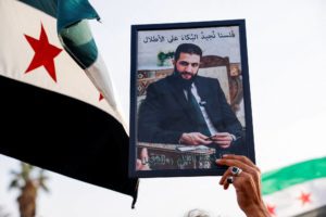 مظاهرات في سوريا احتفالاً بمرور عام على بدء معركة إطاحة الأسد (صور)